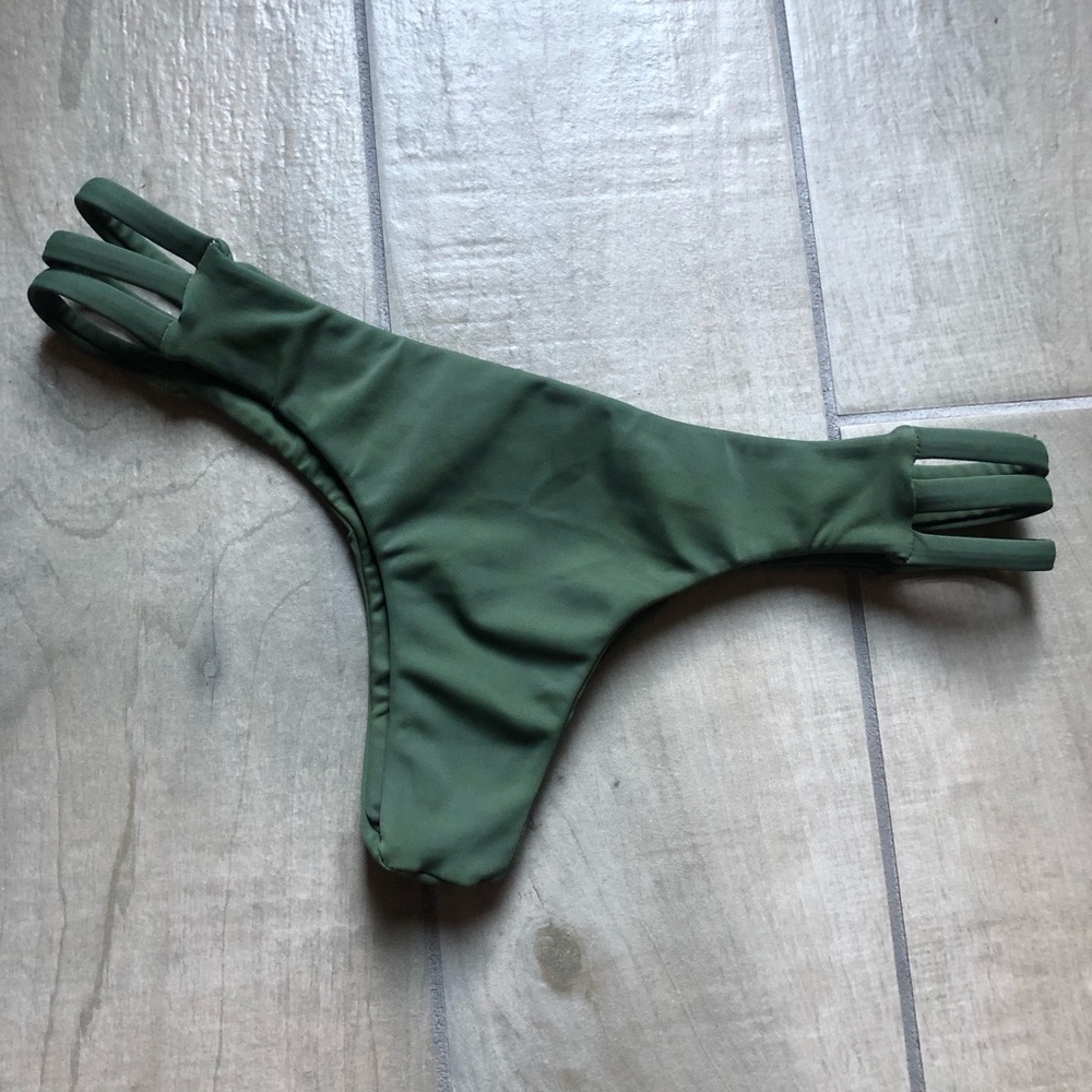 Stone fox swim Strappy thong bikini bottom.